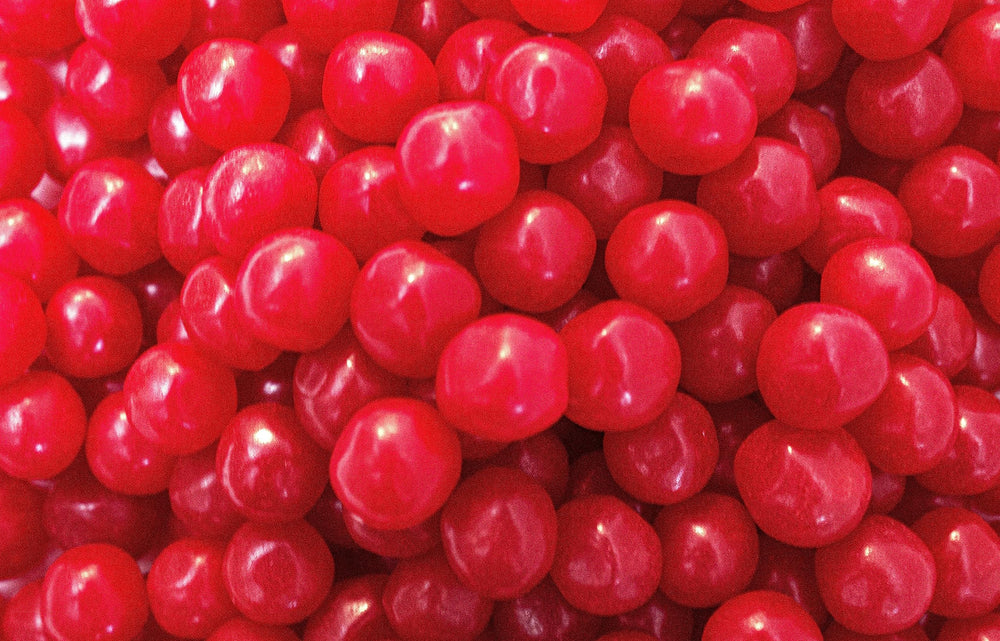 DM Sweets Cherry Sours bag front view highlights chewy texture for snack time