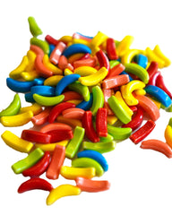 Blue and purple pieces brighten vending machines with DM Sweets Crazy Banana Candy.