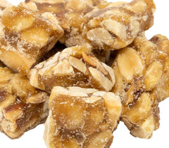DM Sweets Old Fashioned Crunchy Peanut Squares in a 1 lb bag, front view showing freshness