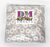 DM Sweets Orange Mints closeup of individually wrapped hard candy for easy snacking.