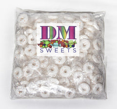 DM Sweets Orange Mints closeup of individually wrapped hard candy for easy snacking.
