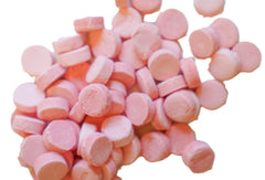 DM Sweets Pink Wintergreen Lozenge Mint bulk bag on counter.