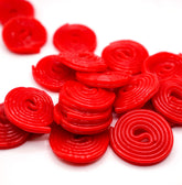 DM Sweets Red Strawberry Licorice Wheels in a bag, fresh and ready to enjoy.