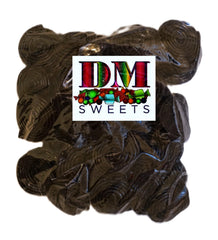 DM Sweets Black Licorice Wheels closeup highlights glossy texture ideal for tasting
