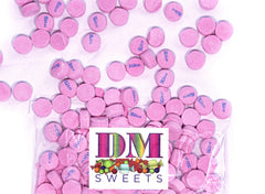 DM Sweets Pink Wintergreen lozenge on serving plate for sharing