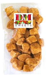 DM Sweets toasted coconut marshmallows 12oz pack with fluffy texture for snacking.