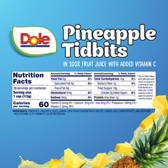 Dole Pineapple Tidbits in juice with spoon, ready to boost bowls and recipes.