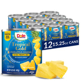 Dole Tropical Gold pineapple chunks in juice close-up showing vibrant pieces.