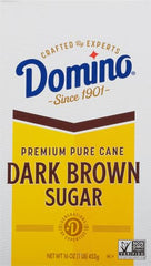 Domino Dark Brown Sugar pouring into tea enhances aroma.