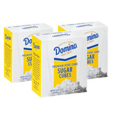 Domino sugar cubes in a 3-pack box gently dissolve for consistent coffee sweetness.