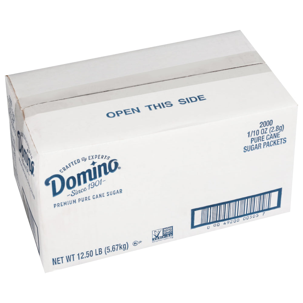 Domino sugar packets in a dispenser box for quick, measured sweetening.