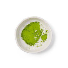 DONA ceremonial-grade matcha whisking scene highlights velvety texture and aroma
