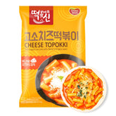 DONG WON Topokki cheese and spicy sauce bowl showcases bold flavors for a quick snack.