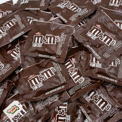 Donty-Tonty milk chocolate candy with crispy shell, ideal for party favors.