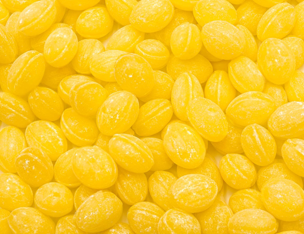 Donty-Tonty Sanded Lemon Drops 14oz bulk packaging in a clear bag for easy sharing.