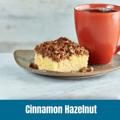 Cup of Door County Coffee Cinnamon Hazelnut Decaf steaming for breakfast