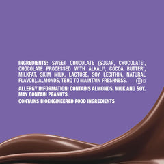 Silky dark chocolate with almond crunch close-up.