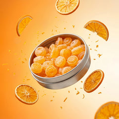 Office desk scene with coworkers enjoying Dr. Variety Retro Sours Tangerine.