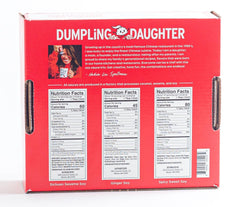 Dumpling Daughter ginger soy bottle close-up highlighting fresh ingredients for flavorful meals.