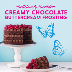 Duncan Hines Dolly Parton frosting spread on cake for smooth coverage.
