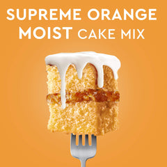 Duncan Hines Orange Supreme cake mix in a bowl with dry ingredients ready to mix.