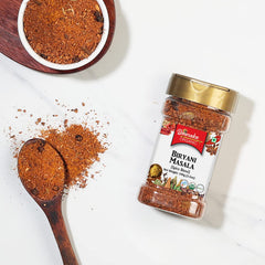 Dwaraka Organic Biryani Masala packaging demonstrates certification and natural ingredient list.