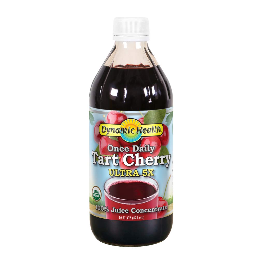 Dynamic Health Tart Cherry Juice Concentrate bottle on kitchen counter, unsweetened and ideal for smoothies.
