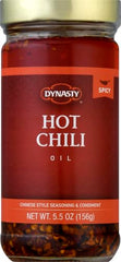 Dynasty hot chili oil bottle pour shows a glossy spicy drizzle to elevate dishes