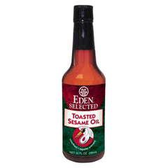 Eden toasted sesame oil bottle view, premium unrefined flavor for vibrant stir-fries.