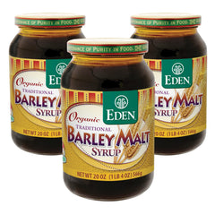 Eden traditional organic barley malt syrup jar on a shelf, ideal for natural baking sweetness.