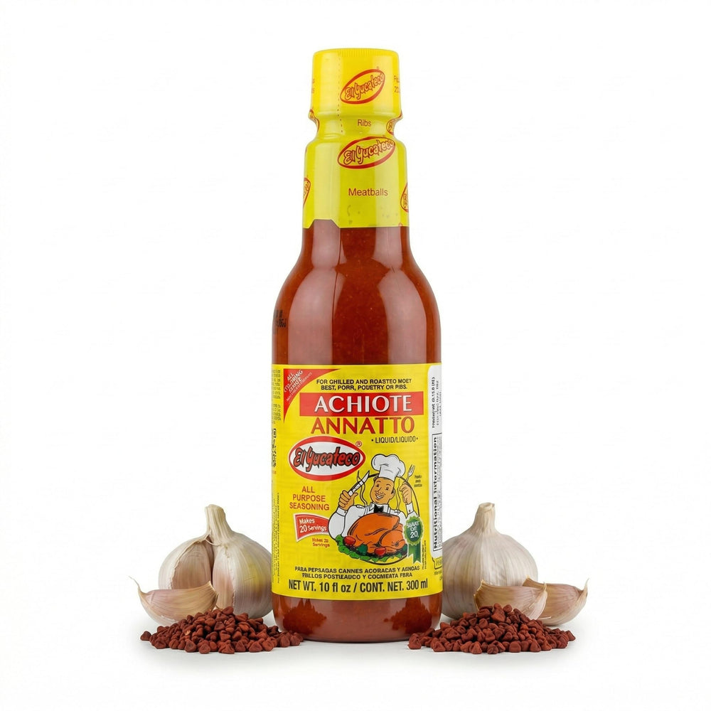 El Yucateco Achiote liquid bottle pour showing ready-to-use marinade for meats