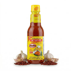 El Yucateco Achiote liquid bottle pour showing ready-to-use marinade for meats