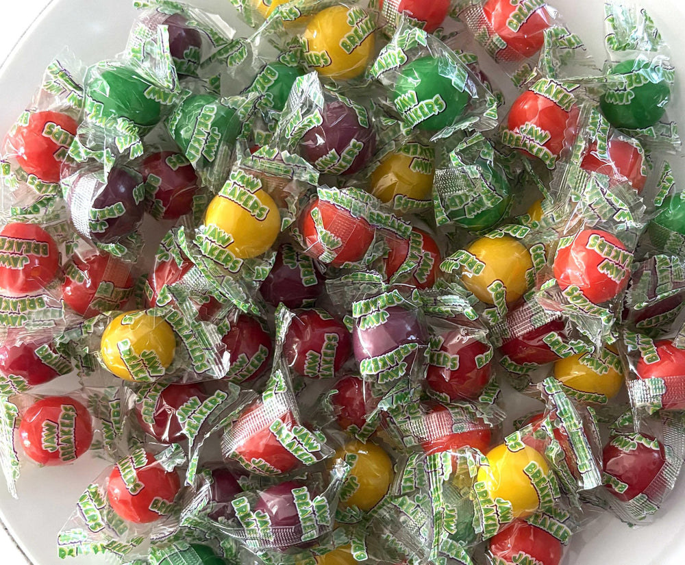 Emporium Candy jaw breakers in assorted fruit colors for festive party favors.