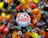 Emporium Candy orange-wrapped fruit barrel for on-the-go snacking and sharing.