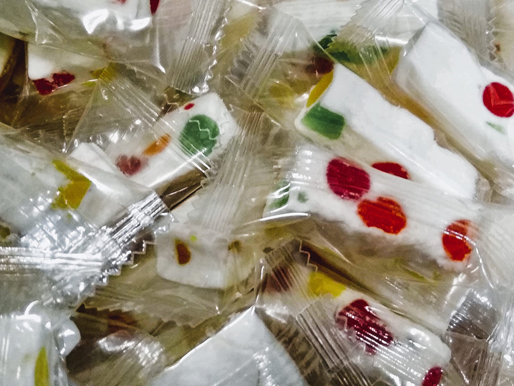 Emporium Candy Wrapped Jube Nougats 8oz in colorful pieces for on-the-go snacking.
