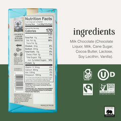 Endangered Species Milk Chocolate Bar broken piece reveals creamy texture ideal for snacking.