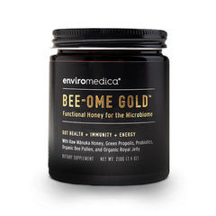 Enviromedica Bee-Ome Gold bottle close-up highlighting raw Manuka honey richness for daily support