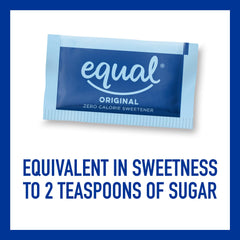 Equal 0 Calorie packets stirred into a fruit smoothie for sugar‑free sweetness
