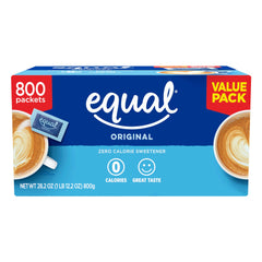 Equal 0 Calorie packets beside a steaming coffee cup, ideal for hot drinks.