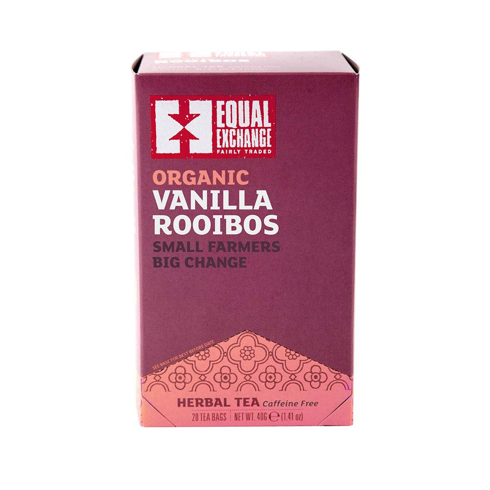 Equal Exchange Vanilla Rooibos Tea box on table, inviting caffeine-free indulgence.