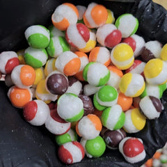 Close-up of freeze dried rainbow candy reveals airy crunch and intense fruit notes
