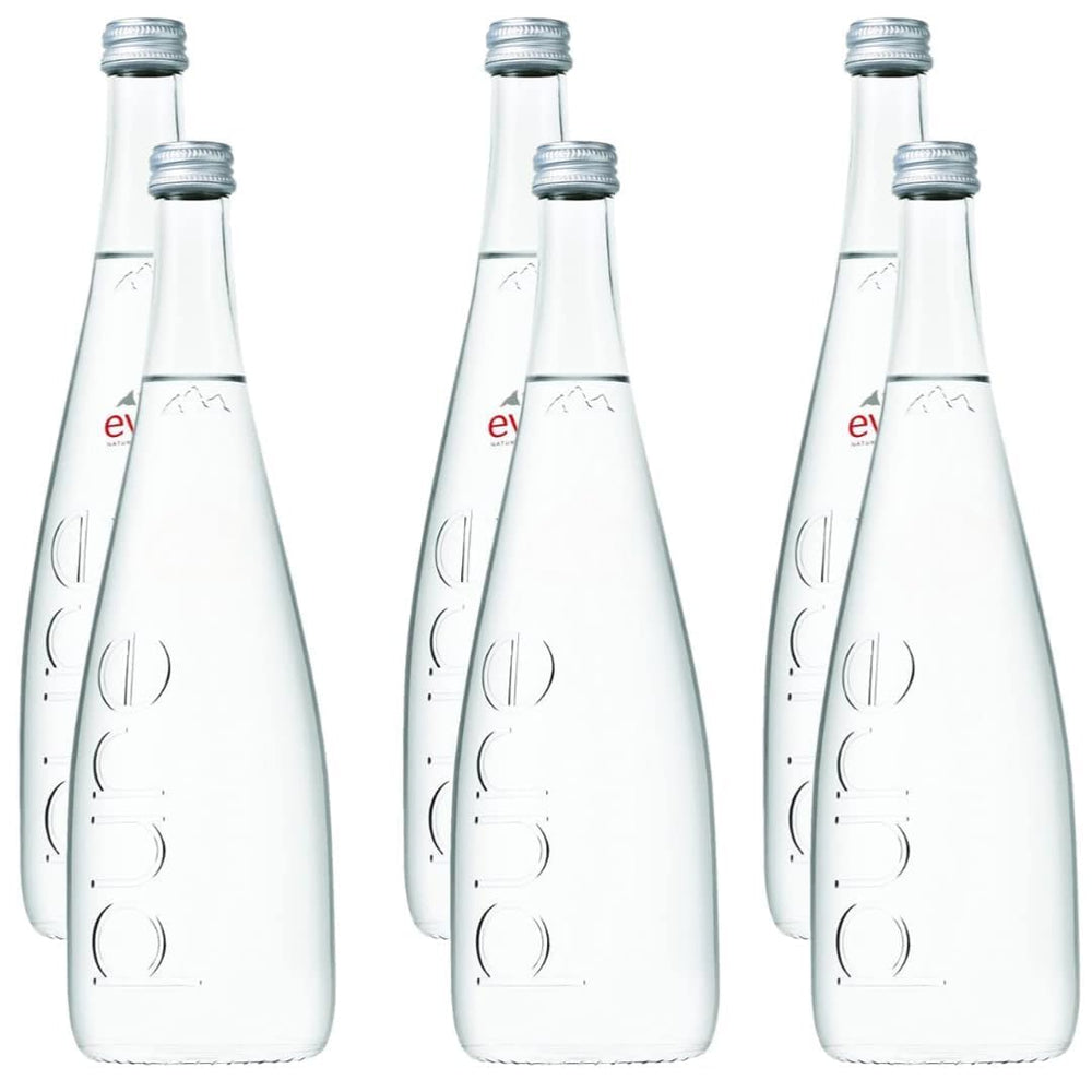 Eviian natural mineral water in a glass bottle elevates table setting and refreshment