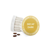 Fabula decaf dark roast pods in airtight packaging for freshness.