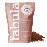 Fabula Light Roast coffee bag with fresh beans for a bright morning cup.