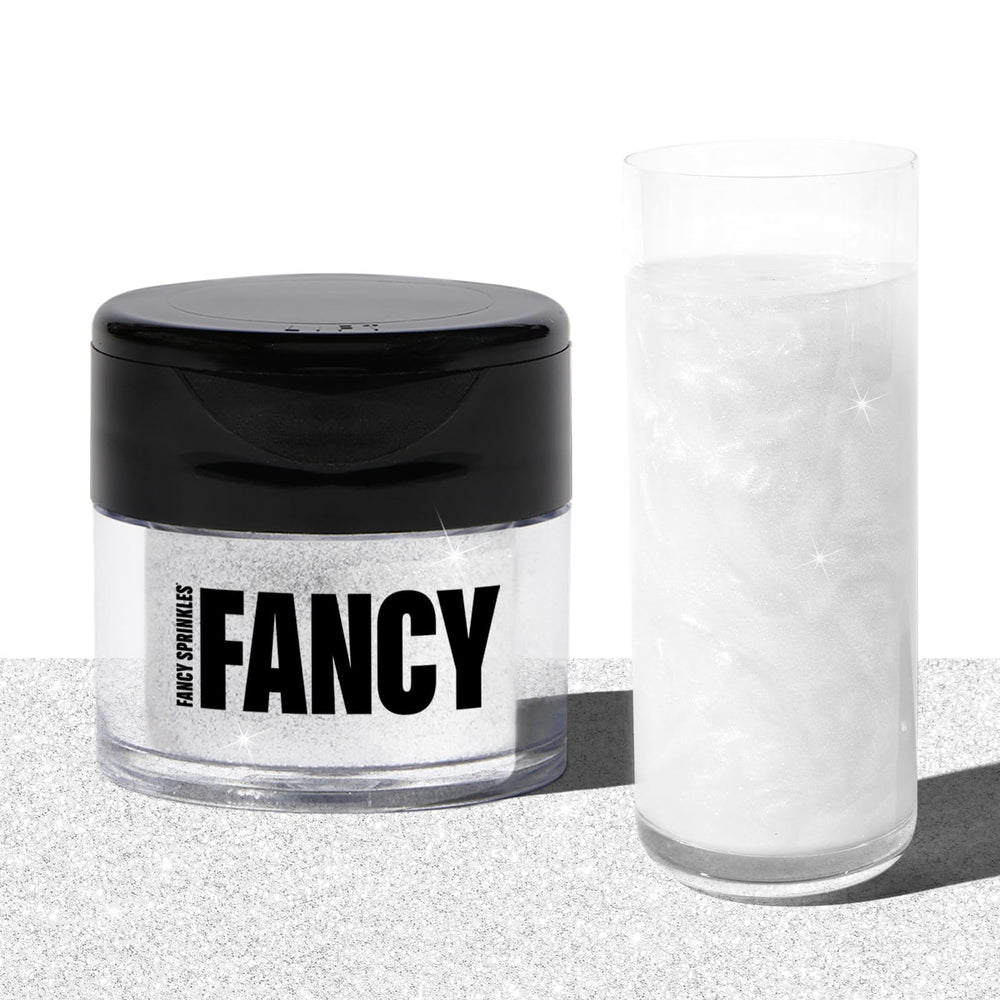 Fancy Sprinkles Easter Diamond White glitter jar adds shimmering, tasteless sparkle to foods and drinks.