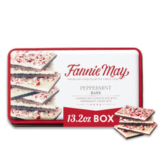 Fannie May Peppermint Bark gift tin ready for holiday gifting on a festive table