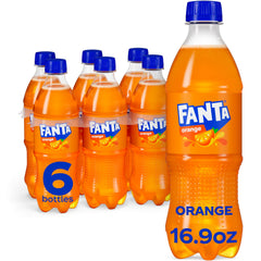 Fanta Orange Soda bottle poured into a glass with ice for a refreshing citrus chill.