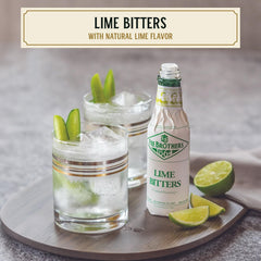Fee Brothers Lime Cocktail Bitters bottle side view highlighting packaging and flavor notes for mixing