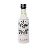 Fee Brothers Molasses Bitters bottle closeup; rich flavor enhancer for cocktails.