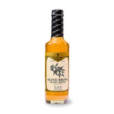 Fee Brothers Olive Brine bottle for authentic dirty martinis and depth.